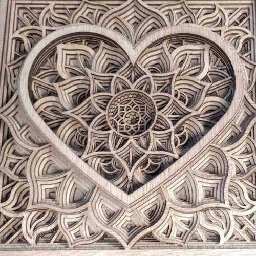 This exquisite wooden panel features a captivating blend of artistry and nature. The focal point is a delicately crafted heart, interwoven with a mesmerizing mandala design. Intricate details bring a sense of warmth and sophistication to any space.