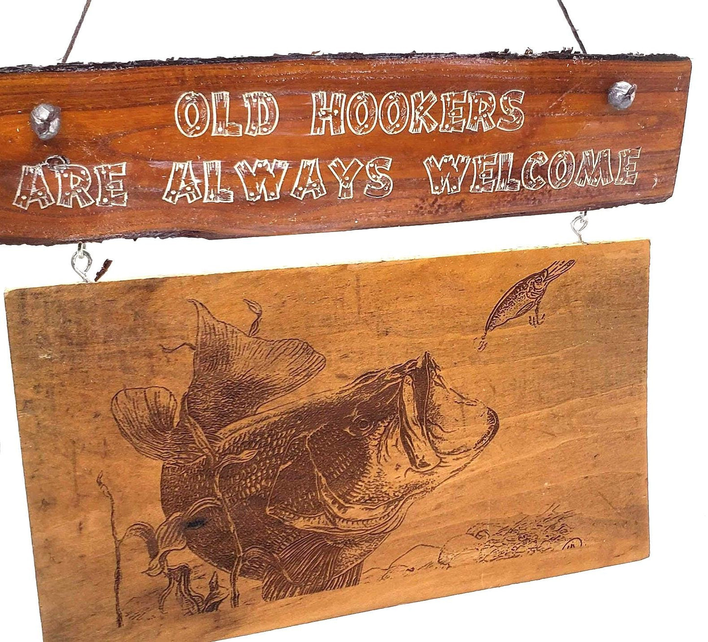 This is a funny sign that would look great on the front door of a cabin or a lakeside bar. It features the words "Old Hookers Welcome"!