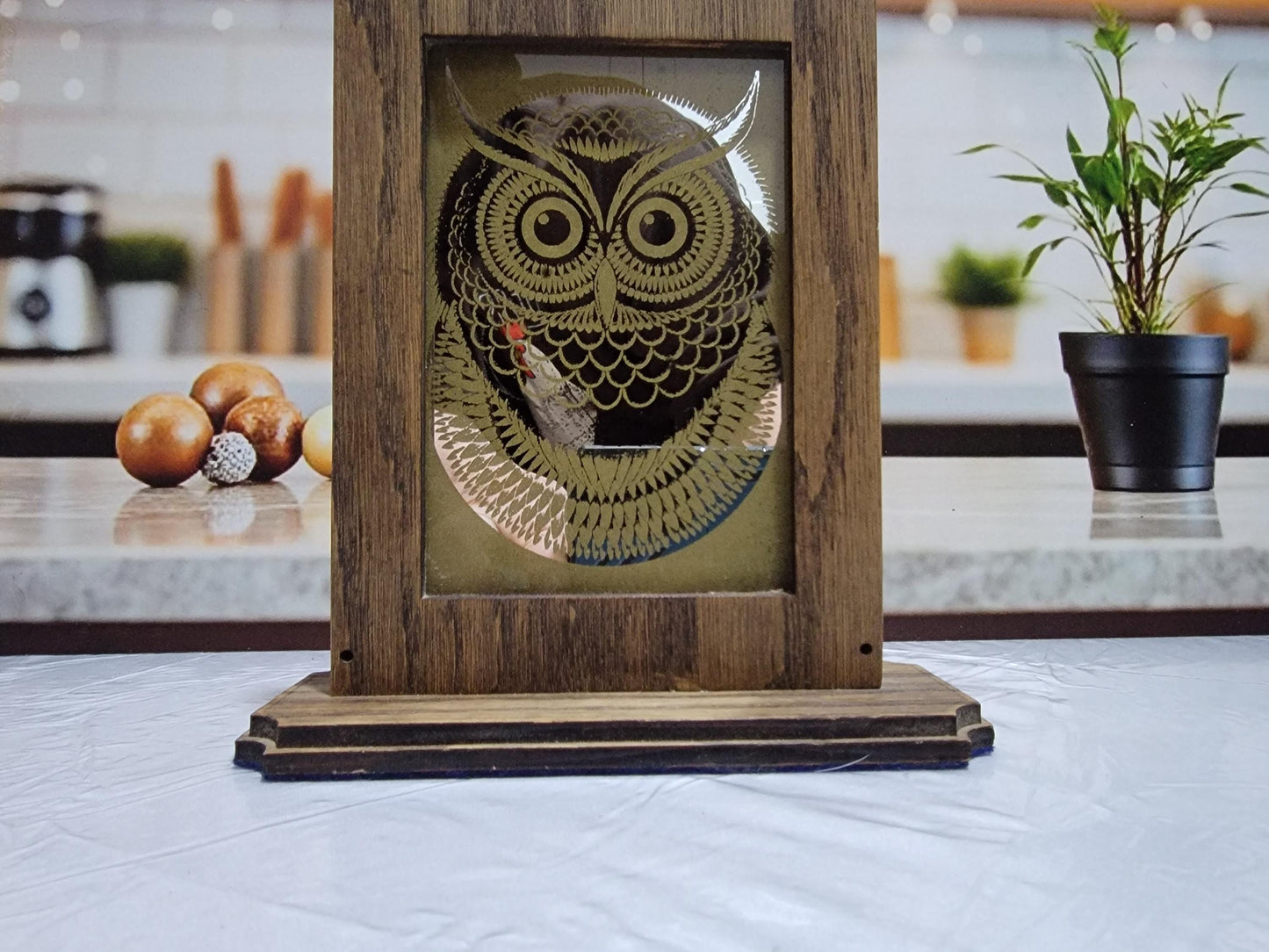 Laser Etched Owl Mirror: Oak Wood Frame, Gold Accents. An oak-framed mirror with owl engraving, compact, elegant, made from fireplace relic.