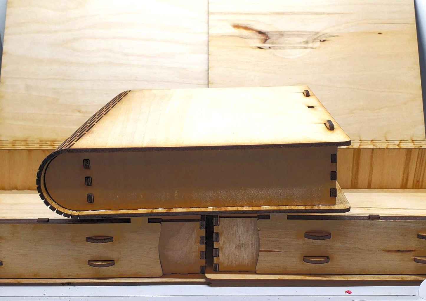 Get your Laser-Cut Birch MDF Secret Book Box with Sliding Latch and Living Hinge Design for Tools, Gifts, Keepsakes, or Hidden Stash Storage