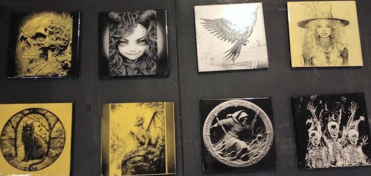 Laser-engraved tiles—spooky, steampunk, on clearance! Each piece is unique, handmade, & comes with a free stand. Limited stock! Buy and save