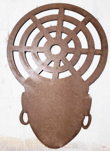 Decorative mask with circular design on a white background