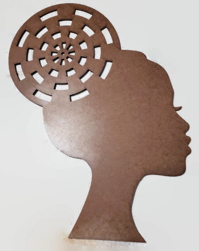 Decorative wall art with a silhouette of a woman's head and a decorative headpiece on a white background