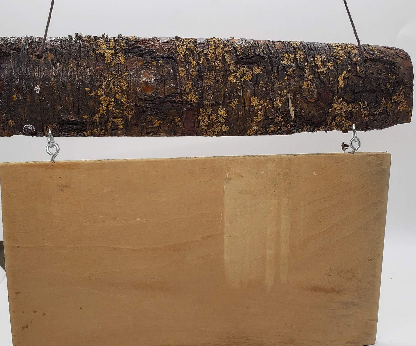 This is a funny sign that would look great on the front door of a cabin or a lakeside bar. It features the words "Old Hookers Welcome"!