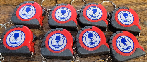 DIGITAL FILE__Use the Mutoh 661 UV Printer and CompressRip setup to ensure that your mini tape measures are securely held during the printing and handling phases. For added protection, consider using a material that’s both ink and UV-resistant, like coated plywood or MDF with a protective finish.