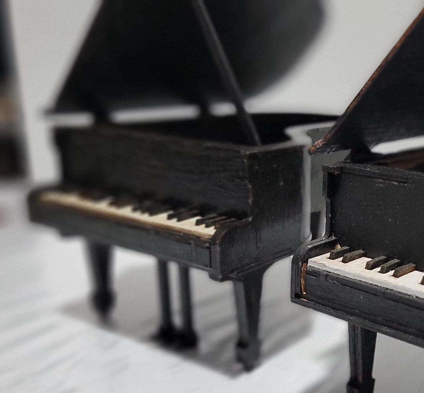 Don’t Miss This One-of-a-Kind Heirloom for Music Lovers
This isn’t just a gift — it’s a showstopper. A handcrafted miniature grand piano jewelry box that captures the soul of a concert hall in the palm of your hand. Designed for those who cherish music, memory, and craftsmanship, this piece is as rare as it is refined.
Meticulously made from solid MDF wood and sealed in a rich matte black finish, it features lifelike piano keys, pedals, and a hinged lid that opens to reveal a hidden jewelry compartment. 